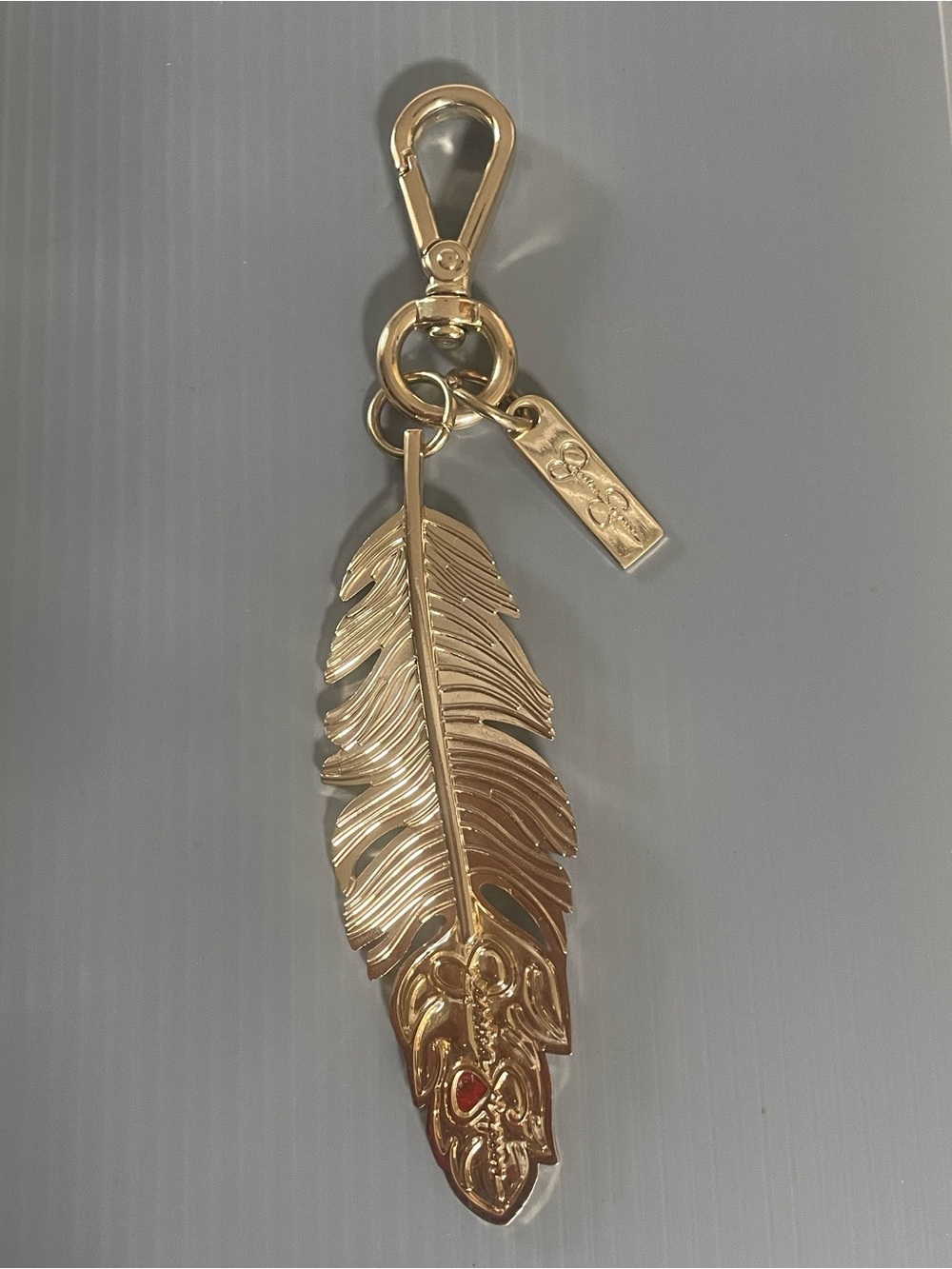 Jessica Simpson Gold Tone Feather Purse Charm